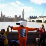 Assange supporters form human chain at UK parliament