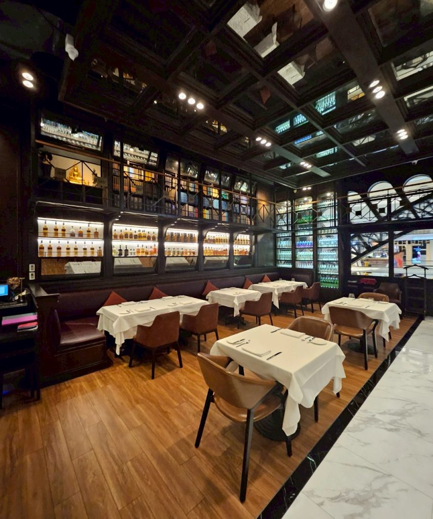 Interior dining space at The Water Library with warm lighting