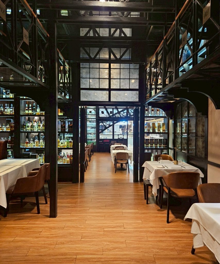 Interior dining space at The Water Library with warm lighting