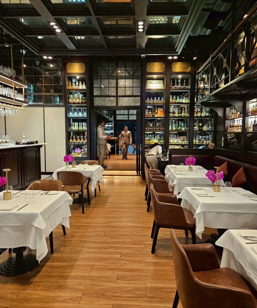Interior dining space at The Water Library with warm lighting