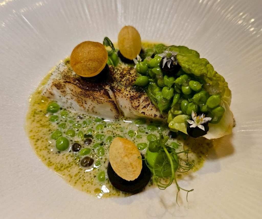 Turbot plated with sweet pea and dill