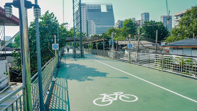 Green spaces in Bangkok – view down The Green Mile elevated walkway lined with trees
