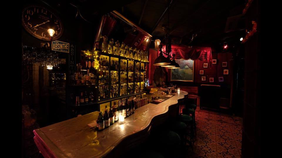 Smalls Bar interior with exposed brick walls and intimate jazz lounge ambiance