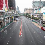 Bangkok's Songkran Serenity: A Photographic Survey of Traffic and Public Sentiment