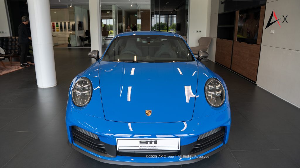"New car delivery bay at Porsche Centre Pattaya, featuring a premium handover area for customer vehicle collection."