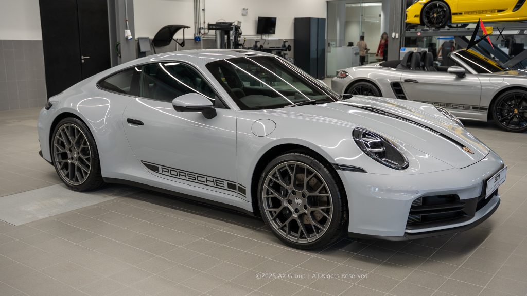 "Technician service area at Porsche Centre Pattaya with certified Porsche technicians performing diagnostics and maintenance in a clean, climate-controlled environment."