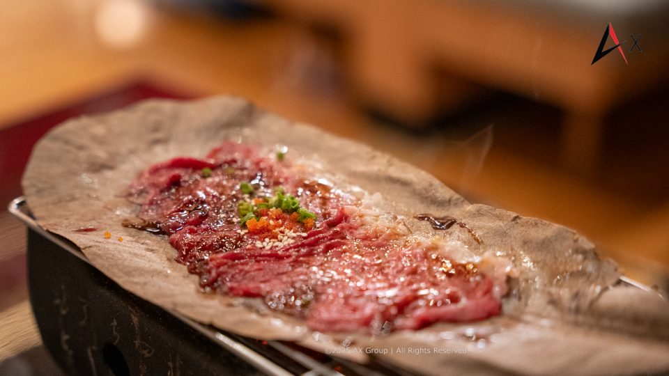 Tableside wagyu beef grilling at Nama Buffet Bangkok rooftop